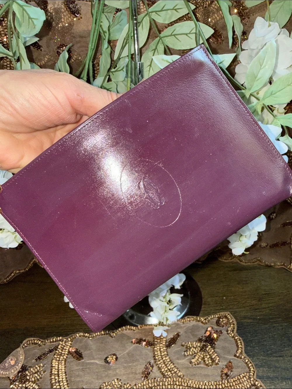 Cartier Plum Leather Embossed Fold Clutch